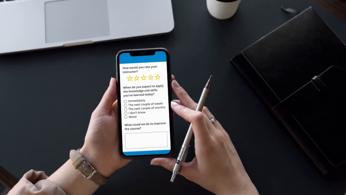 Learner providing customer feedback through a Coursecheck mobile survey on a smartphone